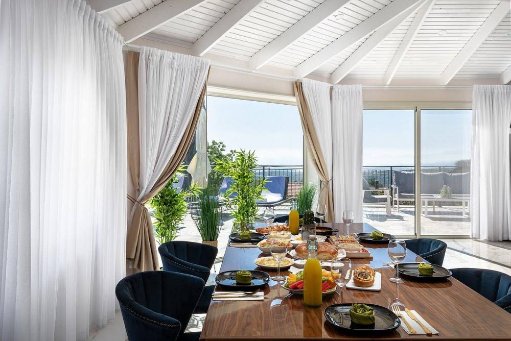 יציאה מהמטבח למרפסת וילה מילגרוס בוטיק, וילה מילגרוס בוטיק, וילה  בעין יעקב וילות - Vila 4 U