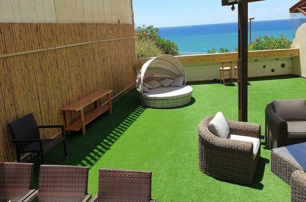 97850 סוויטת כוכב הים עם מרפסת גן 110 מטר וגקוזי איטלקי מול גלי הים, רויאל חוף צאנז וגקוזי איטלקי מול גלי הים, וילה  בנתניה וילות - Vila 4 U